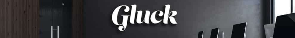 The Gluck logo on a dark backdrop with computer screens.