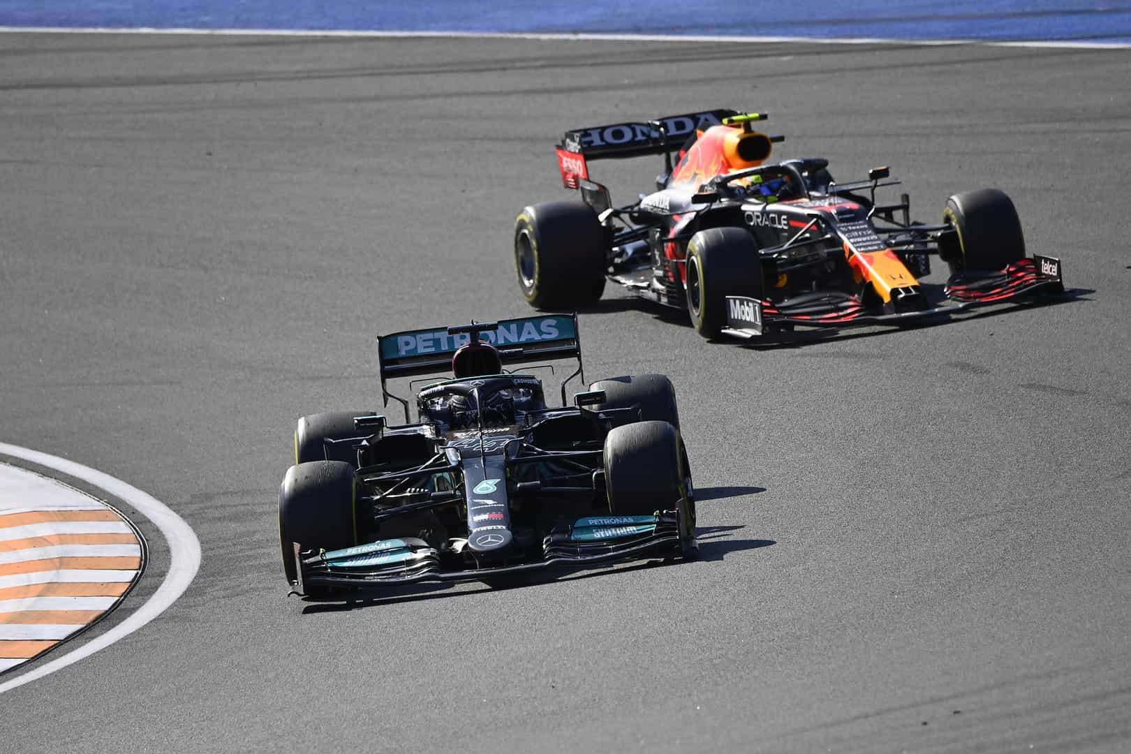 Lewis Hamilton leading Max Verstappen.