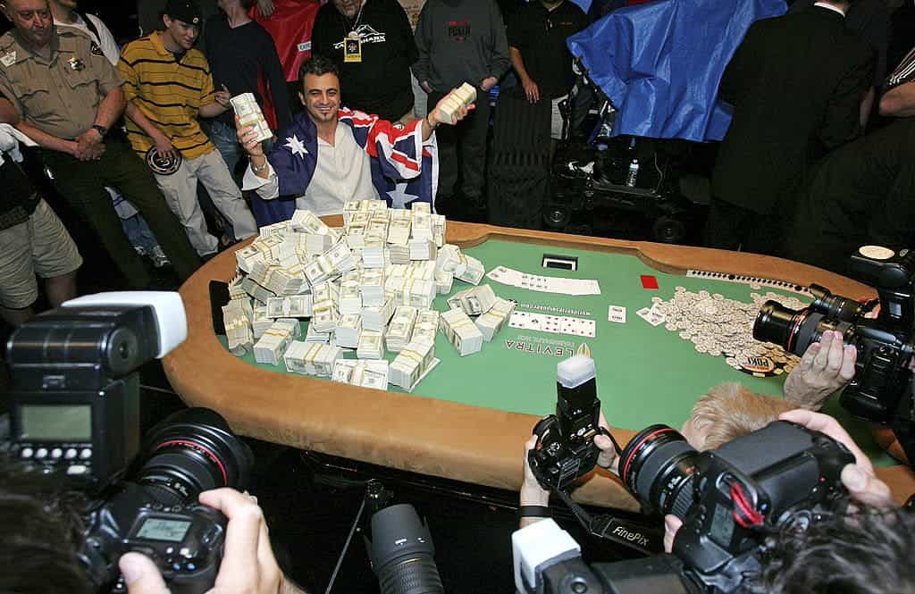 Joe Hachem poses with some of the $7.5 million he won at the 2005 WSOP.