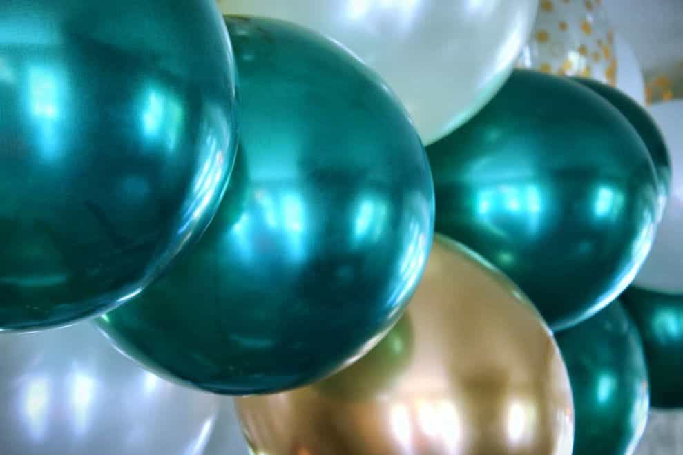 Closeup of multicolored inflated balloons.