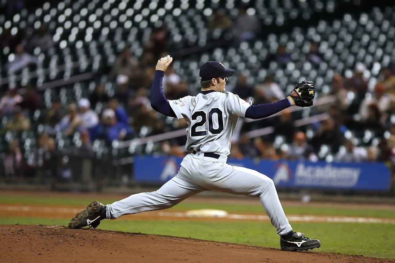 A baseball player playing in the “pitcher” position during a professional baseball game.