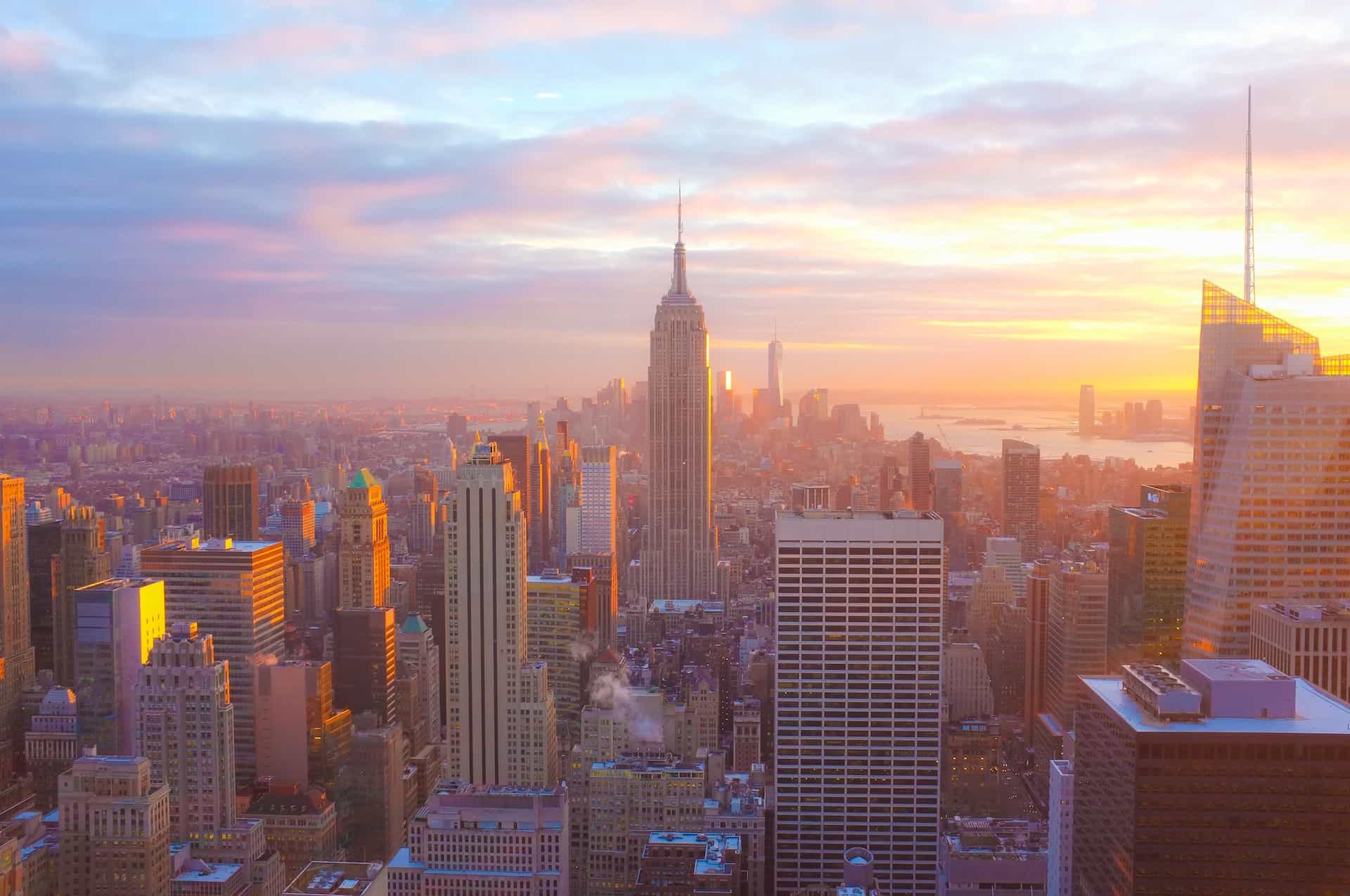The vast skyline of downtown Manhattan in New York City, New York during sunset.